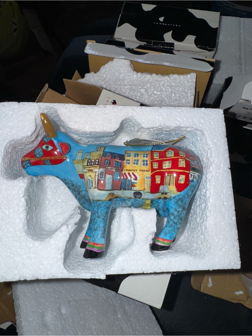 Various multicolor cow ornaments